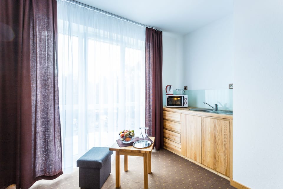 Classic Suite (107,108) | Premium bedding, desk, laptop workspace, blackout drapes