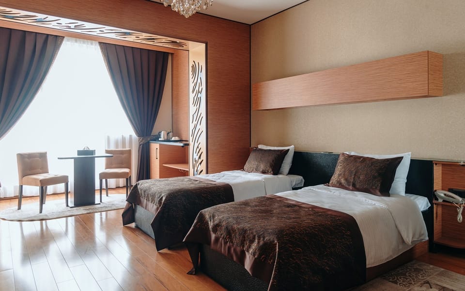 Premium bedding, down comforters, minibar, desk