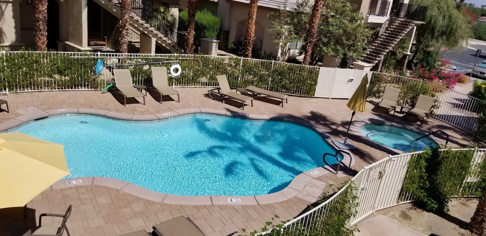 Two pools and jacuzzi's right behind condo