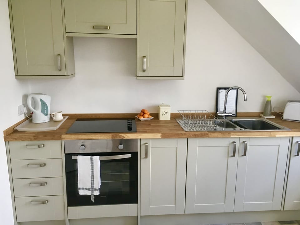 Kitchenliving / dining room overlooking the grounds