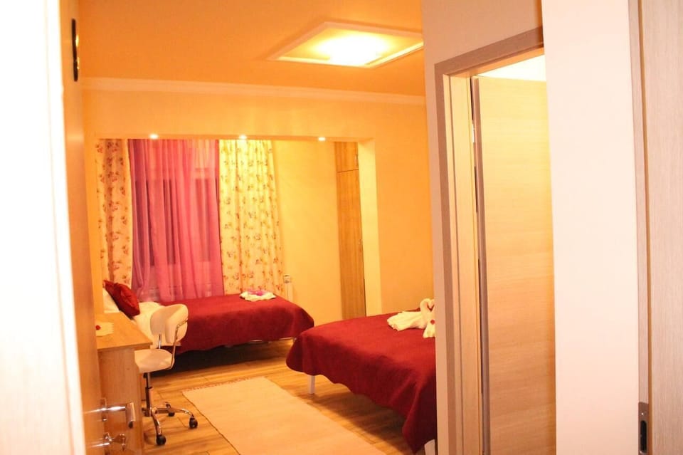 Desk, blackout drapes, soundproofing, iron/ironing board
