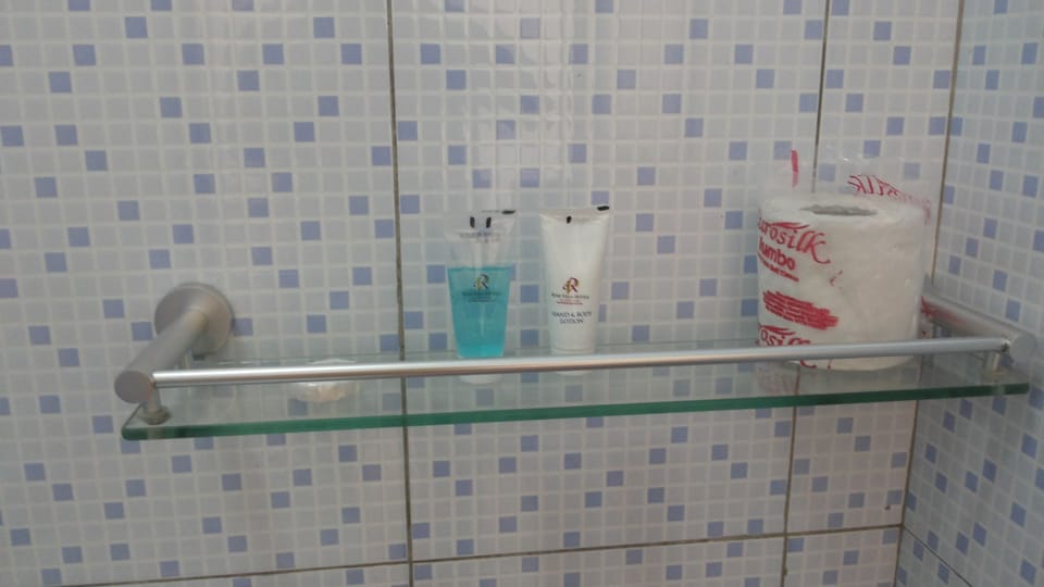 Shower, slippers, towels, soap