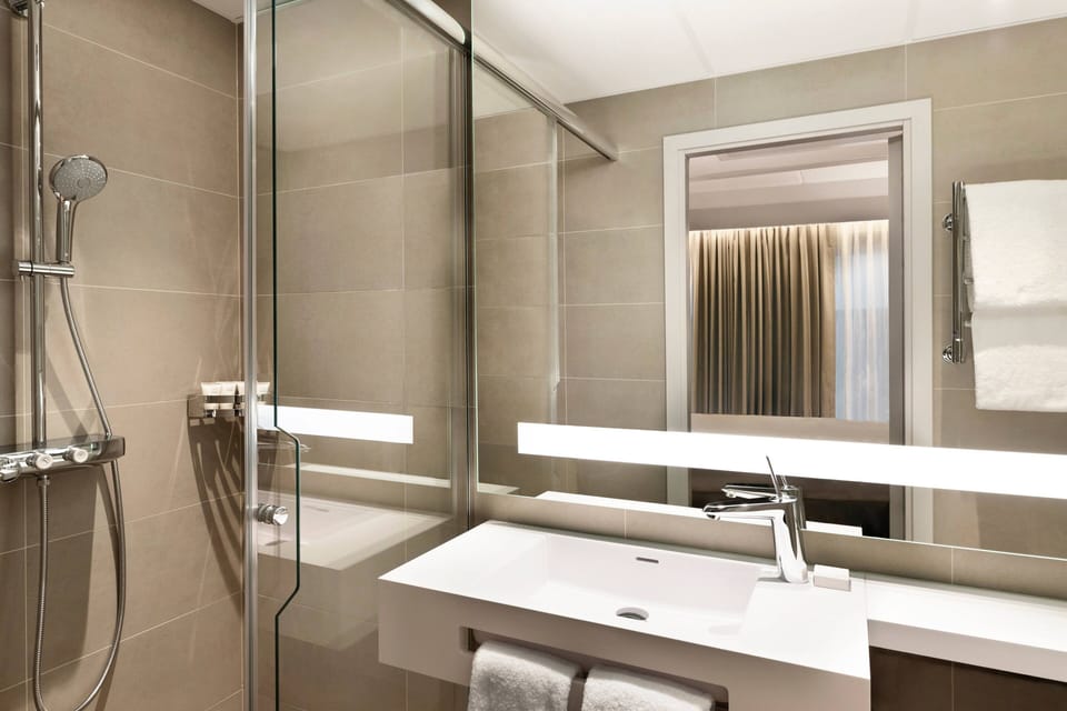 Shower, free toiletries, hair dryer, towels