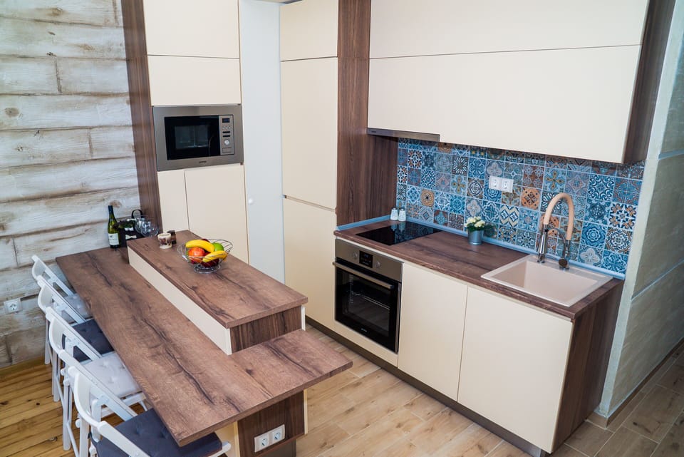 Luxury Apartment | Private kitchen | Fridge, microwave, stovetop, dishwasher