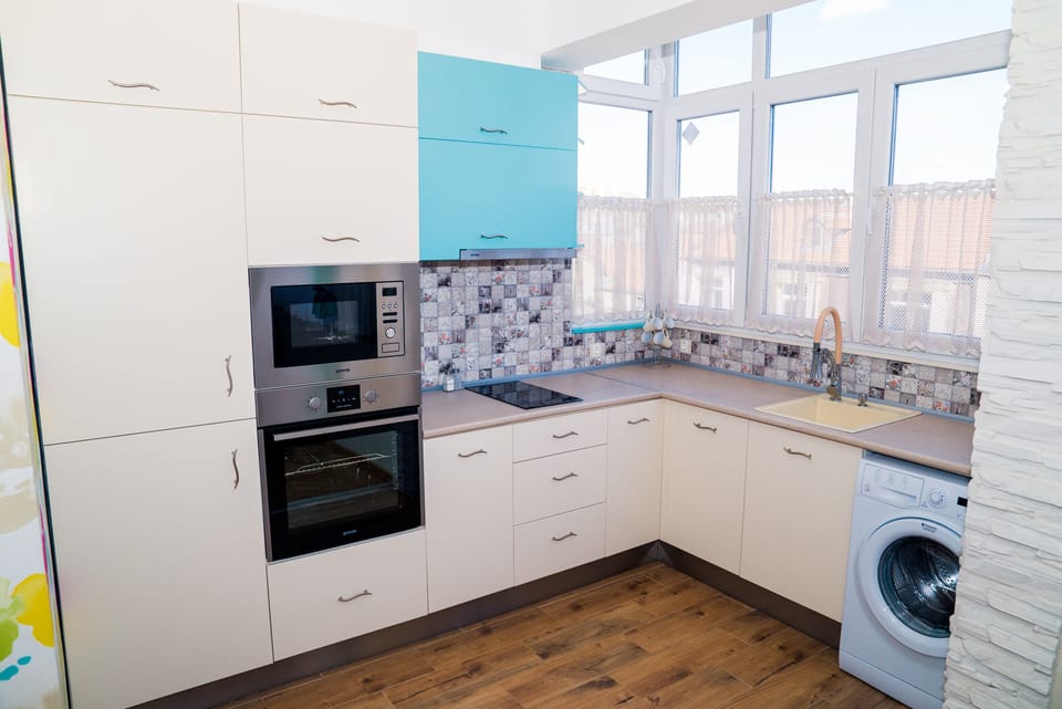 Luxury Apartment | Private kitchen | Fridge, microwave, oven, coffee/tea maker
