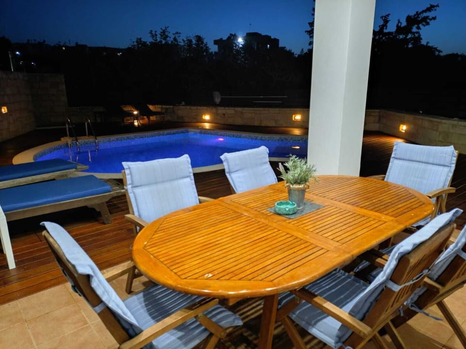 Pool lights and outside dining area