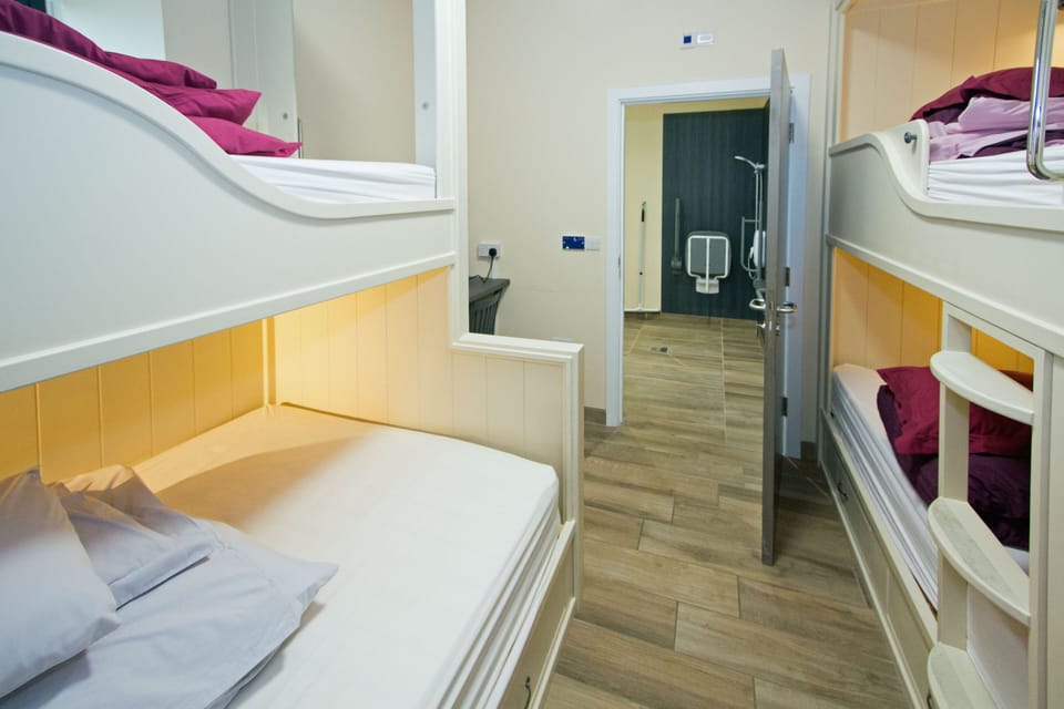 Family Room (Wheelchair Accessible) | In-room safe, soundproofing, free WiFi, bed sheets