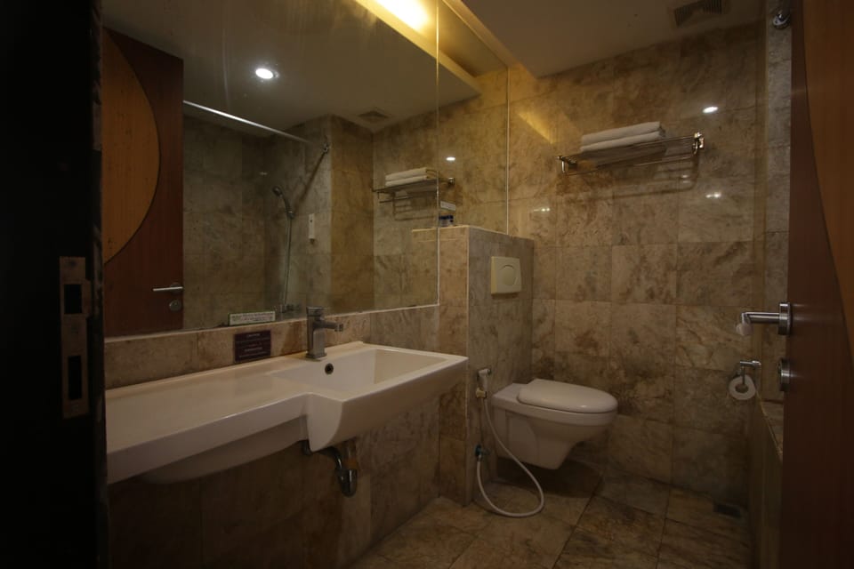 Shower, free toiletries, hair dryer, towels