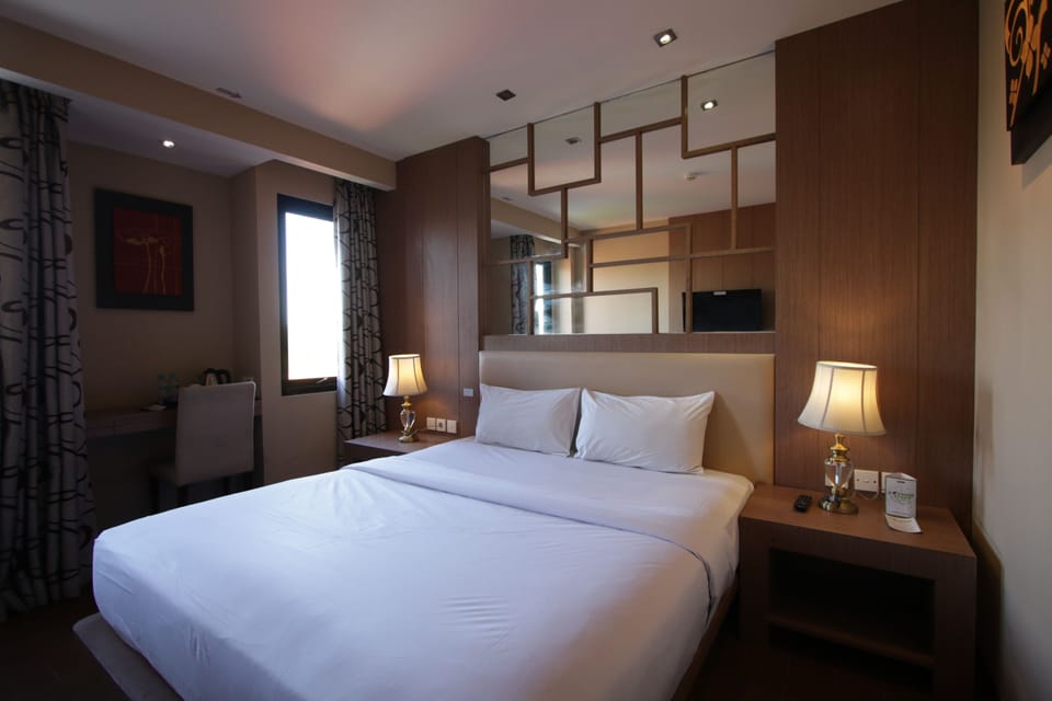 In-room safe, blackout drapes, iron/ironing board, bed sheets