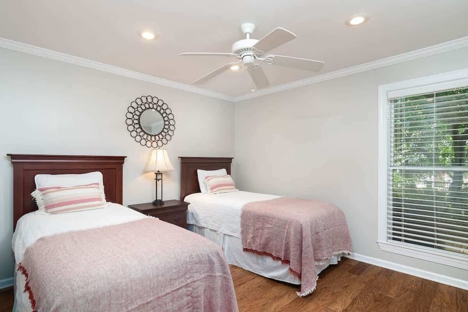 2nd Bedroom with two Full Size twin beds with a TV in bedroom