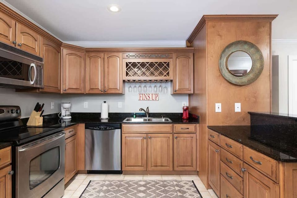 Fully stocked kitchen centrally located off the living area.  Equipped with both a K-Cup coffee Maker and a Drip Coffee Maker.