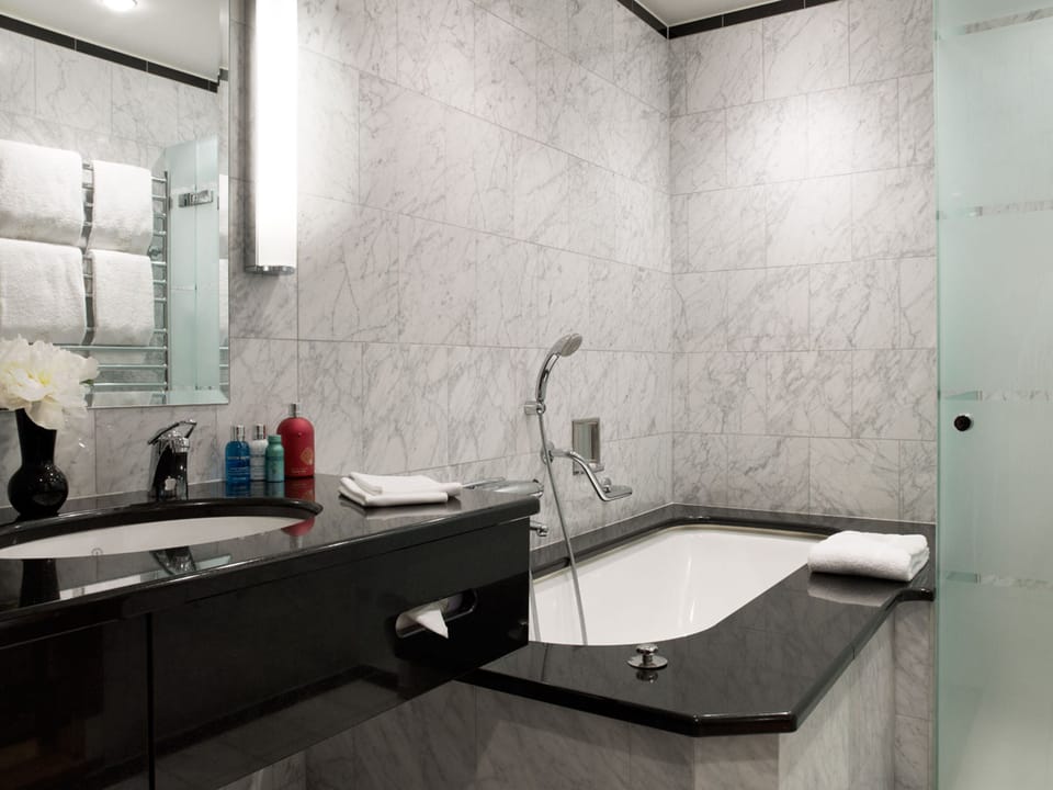 Rainfall showerhead, designer toiletries, hair dryer, bathrobes