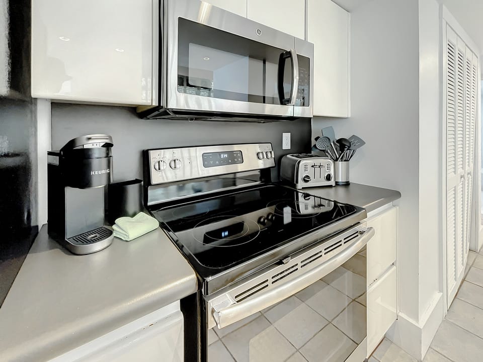 Full-size kitchen with Nespresso, Keurig, and toaster for your brews.