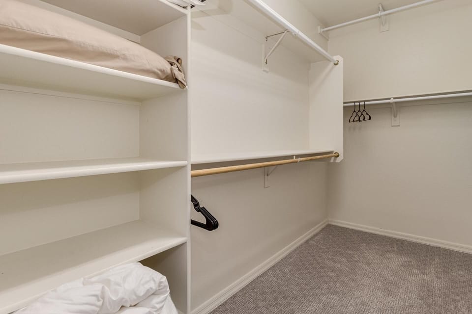 walk in closet in Primary bedroom