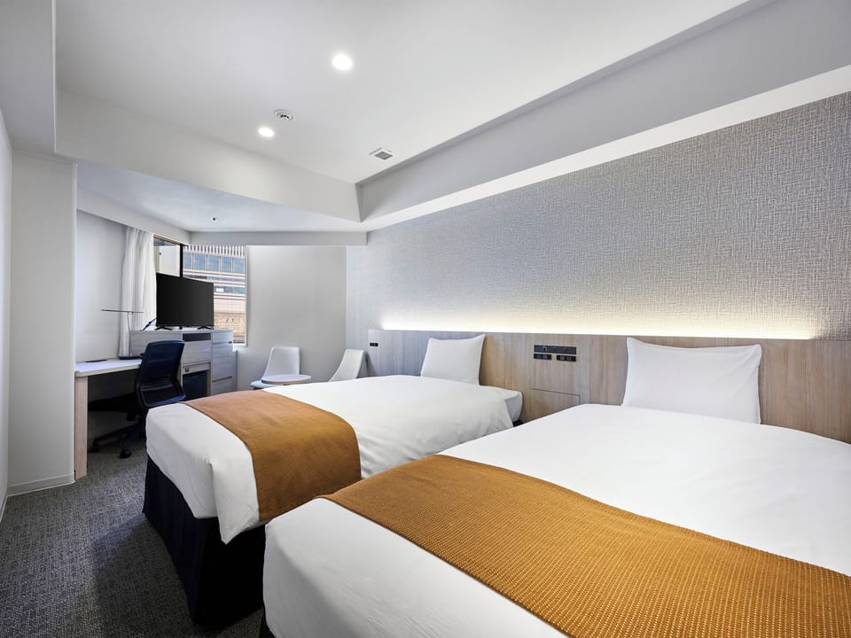 Premium bedding, down comforters, desk, blackout drapes