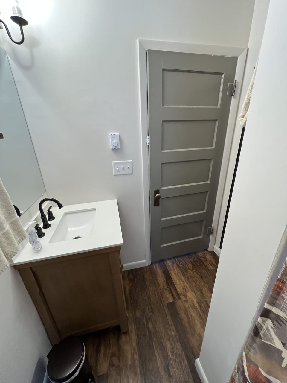 Renovated bathroom with new sink and fixtures