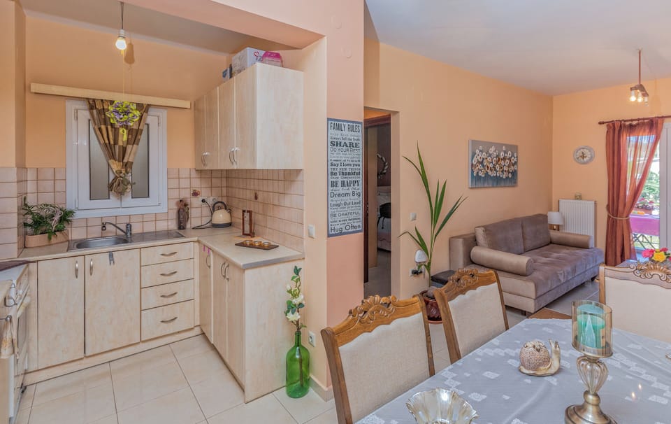 Panoramic Apartment | Private kitchen | Full-size fridge, microwave, oven, stovetop