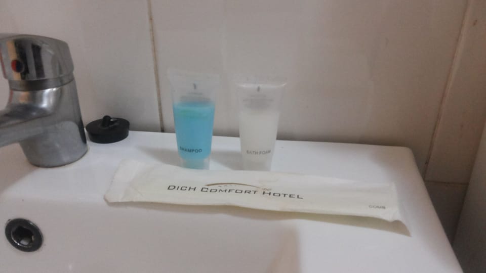 Shower, free toiletries, slippers, towels