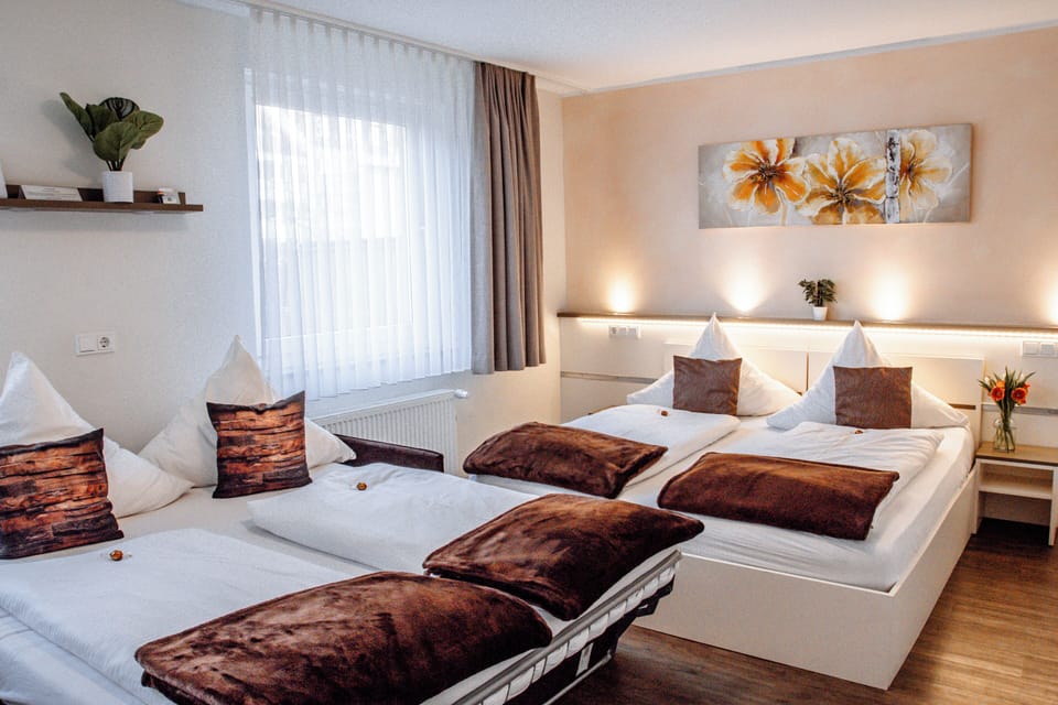 Family Room | Hypo-allergenic bedding, desk, laptop workspace, soundproofing