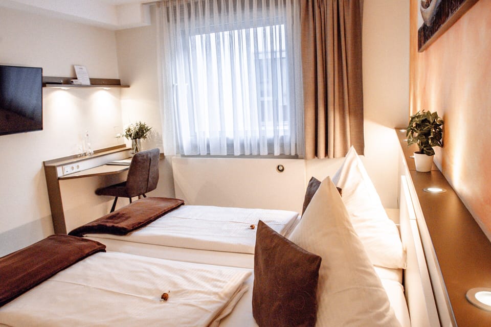 Hypo-allergenic bedding, desk, laptop workspace, soundproofing