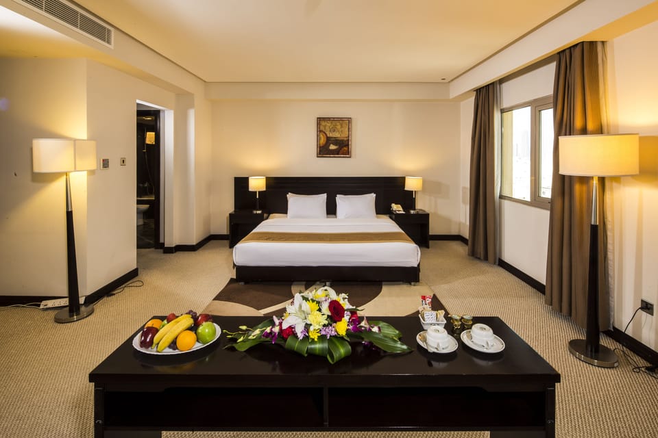 Premium bedding, down comforters, minibar, in-room safe