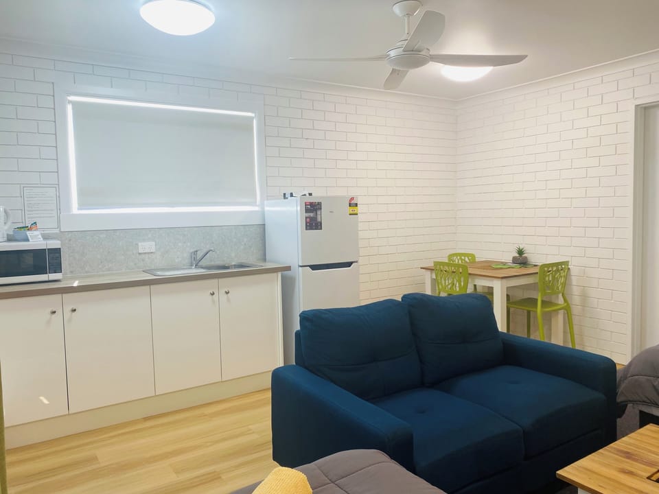 Family Room | Private kitchen | Coffee/tea maker, fridge, microwave, stovetop
