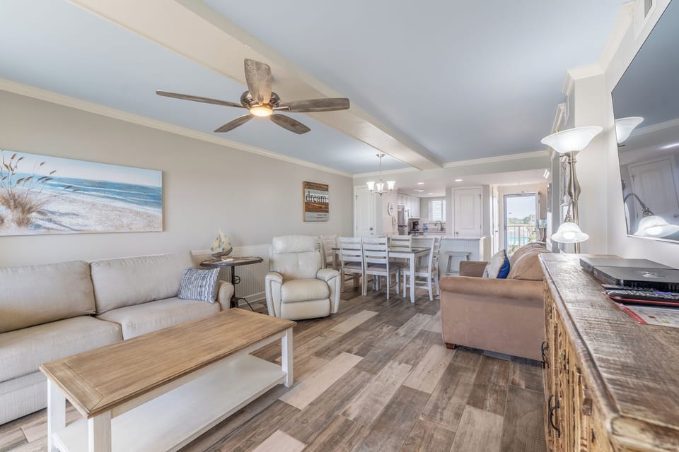 Living area with recliner, sleeper sofa, and double chair!  