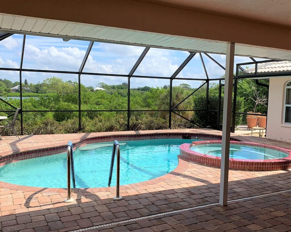 Beautiful Bayfront caged pool