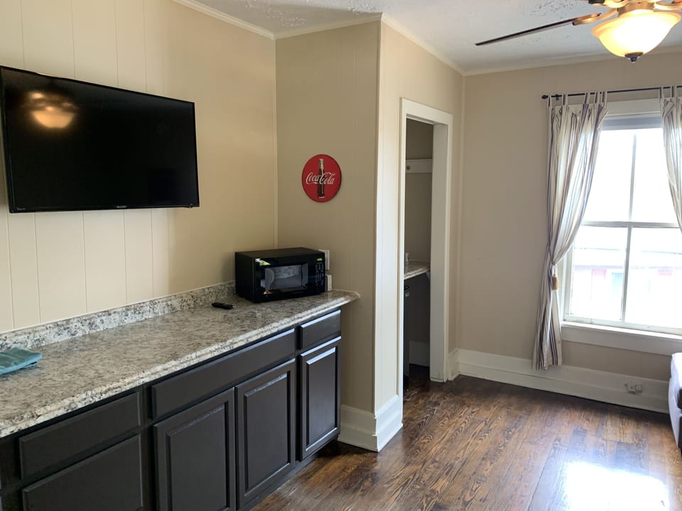 Kitchenette and Living Room with Mini Fridge in Closet