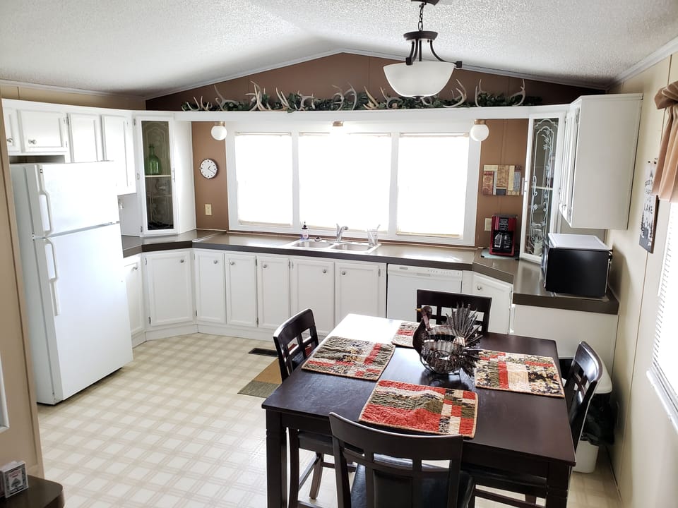 Spacious kitchen with a newly installed dishwasher and everything else needed.

