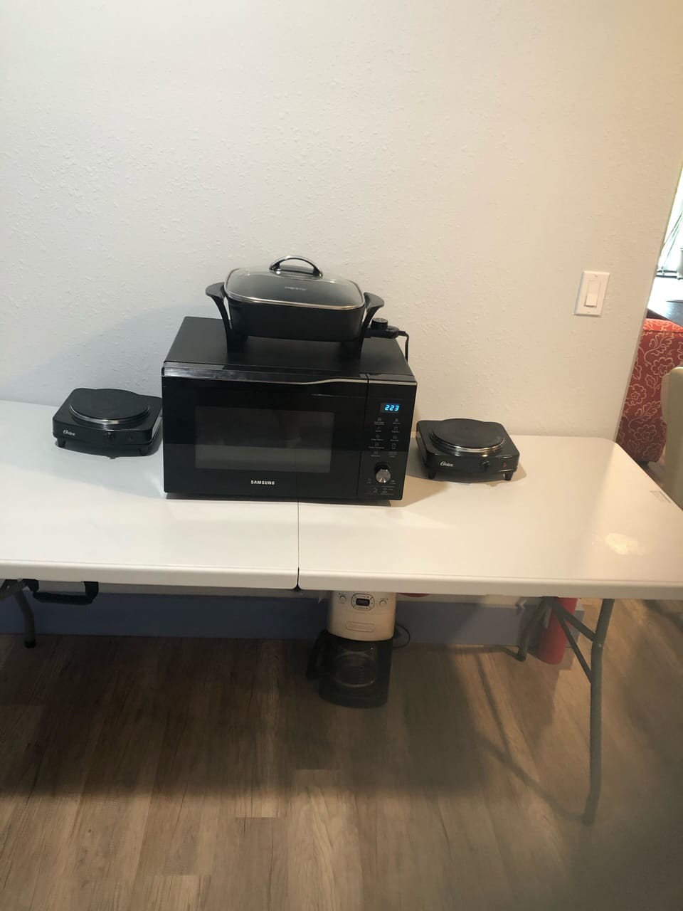 Kitchenette has a   microwave, plus  electric burners and an electric skillet.  
