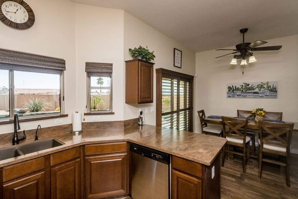 Kitchen and dining with pool and desert view