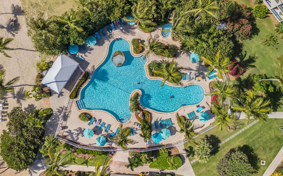 View of the property pool, hot tub and pool/beach side bar