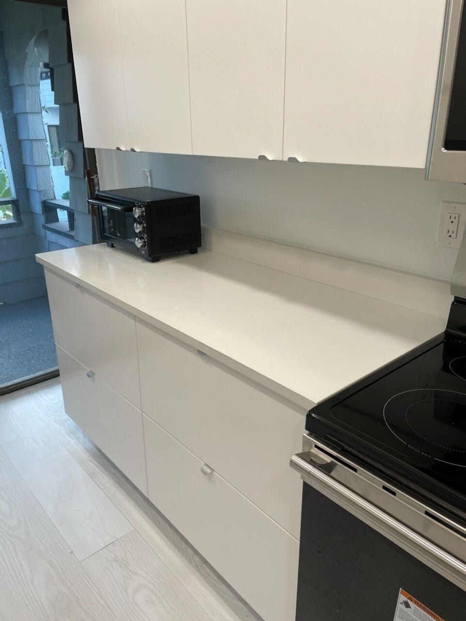 Kitchen CaesarStone counters and stove