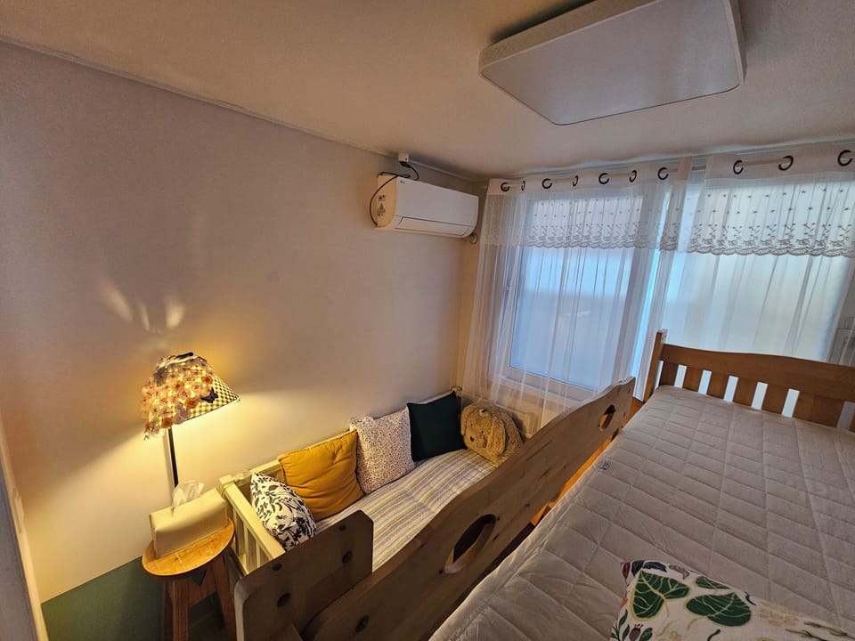 Family Room | Blackout drapes, soundproofing, free WiFi