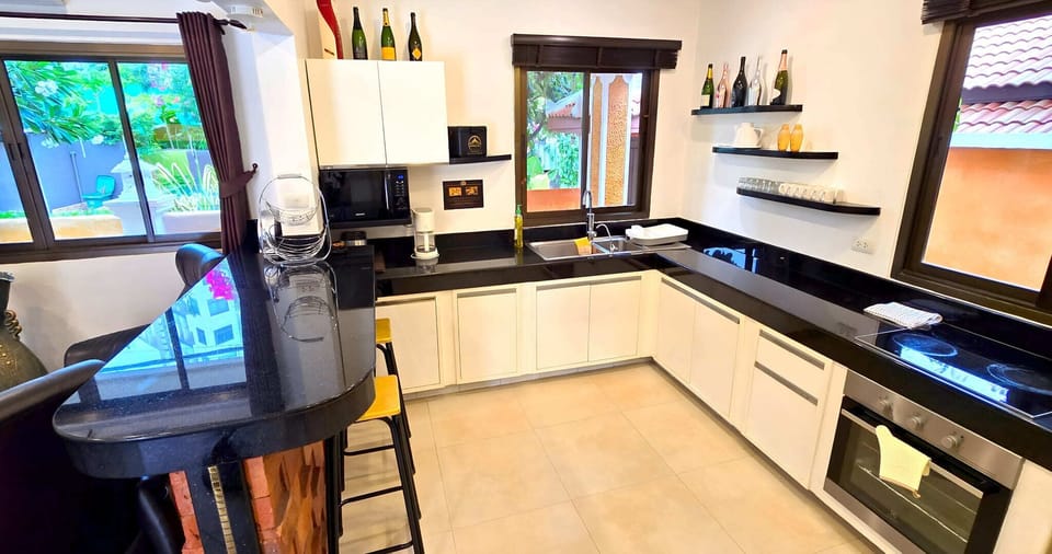 Full-size fridge, microwave, stovetop, espresso maker