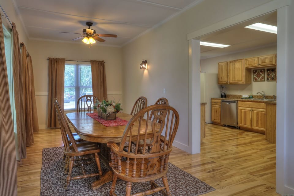 Spacious dining area off of the kitchen with 6 large chairs