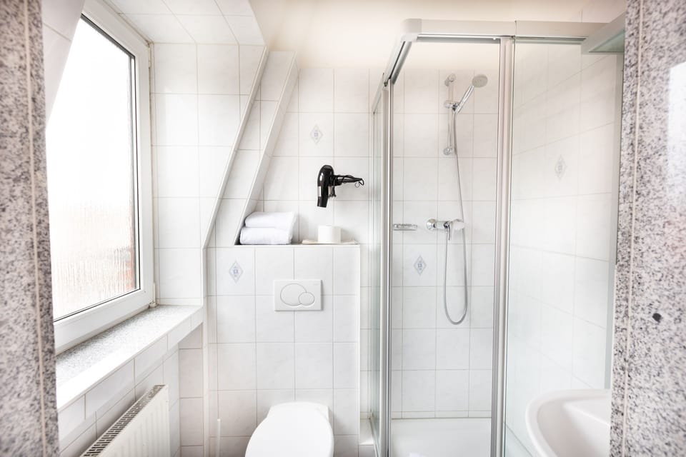 Standard Double or Twin Room | Bathroom | Shower, hair dryer, towels, soap