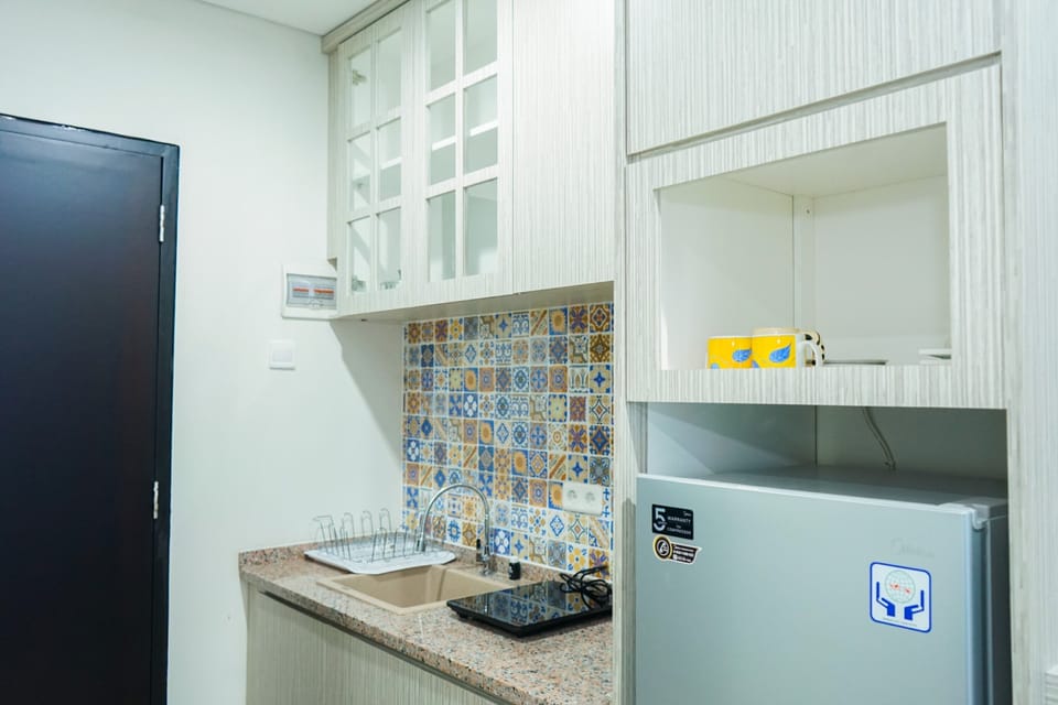 Room | Private kitchen | Fridge, stovetop, electric kettle, cookware/dishes/utensils