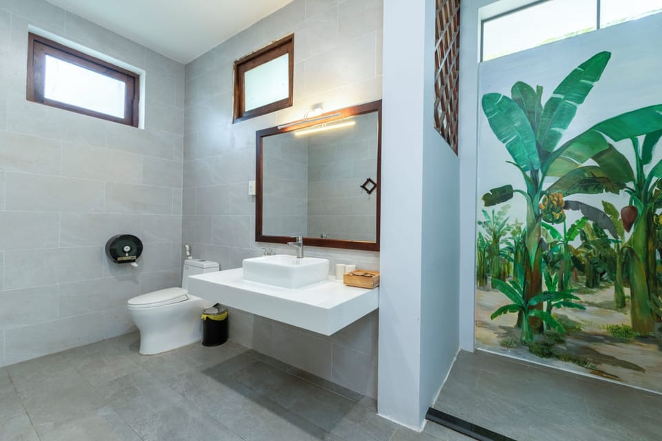 Bungalow, 2 Twin Beds, Pool View | Bathroom | Designer toiletries, hair dryer, bathrobes, slippers
