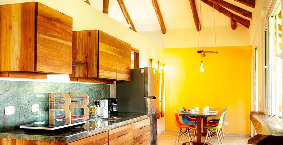 Exclusive Condo, 2 Bedrooms, Non Smoking, Ocean View | Private kitchen | Fridge, highchair