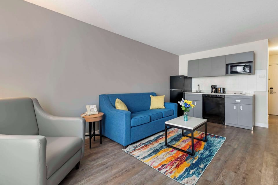 Suite, Multiple Beds, Non Smoking | In-room safe, desk, iron/ironing board, free WiFi