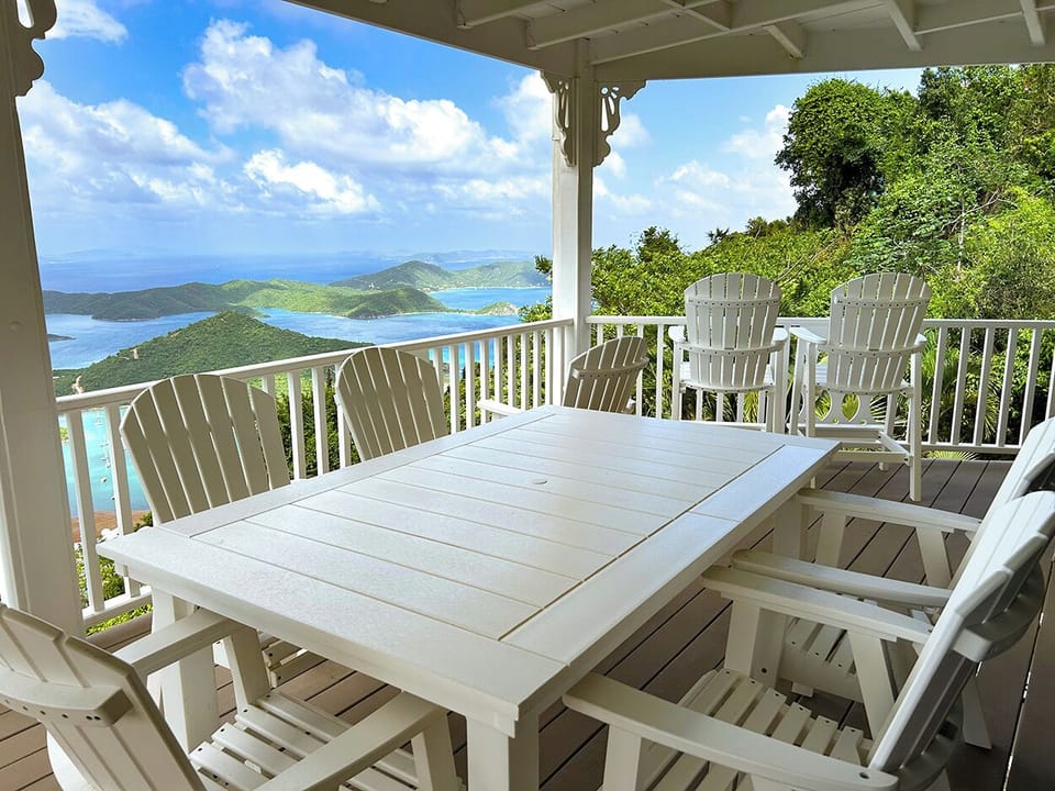 The top level of the home includes an covered deck for outside dining, and enjoying the panoramic views