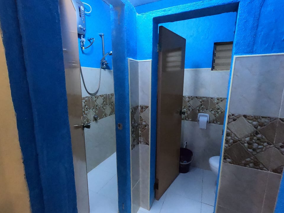 Family Room, Multiple Beds, Garden Area | Bathroom shower