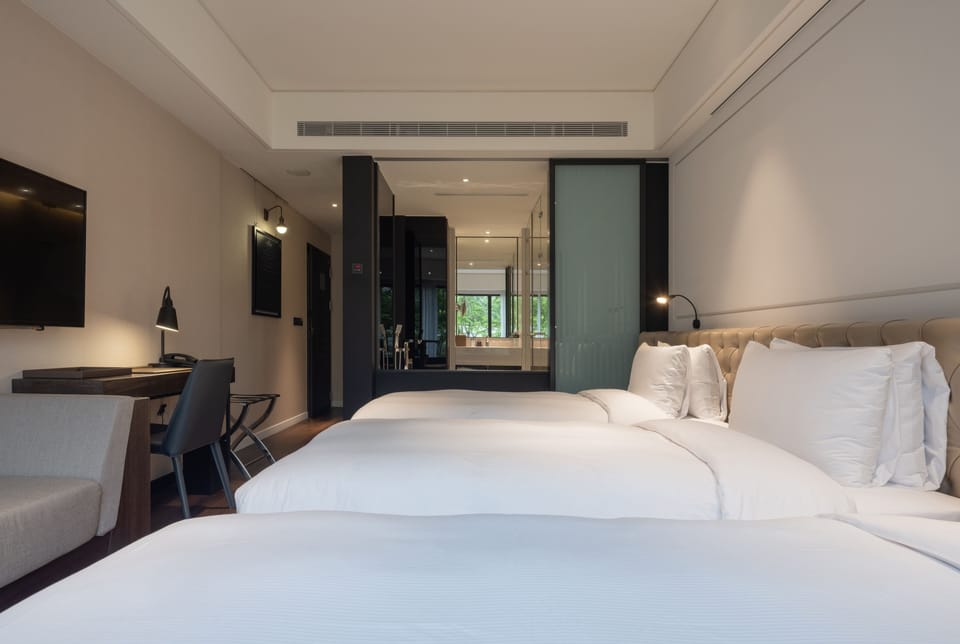 The Studio, 3 Large Twin Beds | Premium bedding, down comforters, pillowtop beds, free minibar