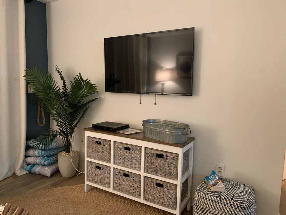 Main living area TV with walkout balcony