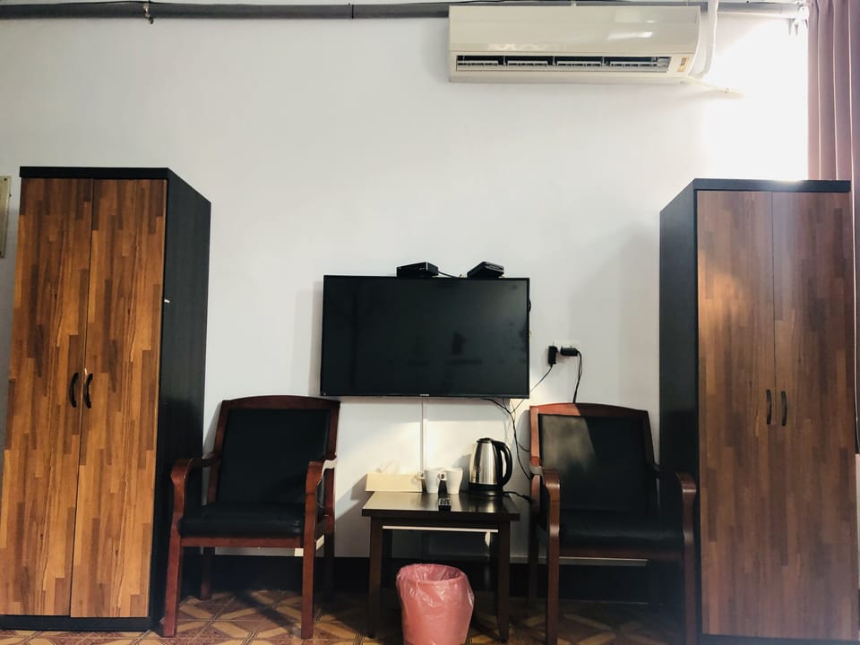 Standard Quadruple Room | Desk, blackout drapes, free WiFi, bed sheets