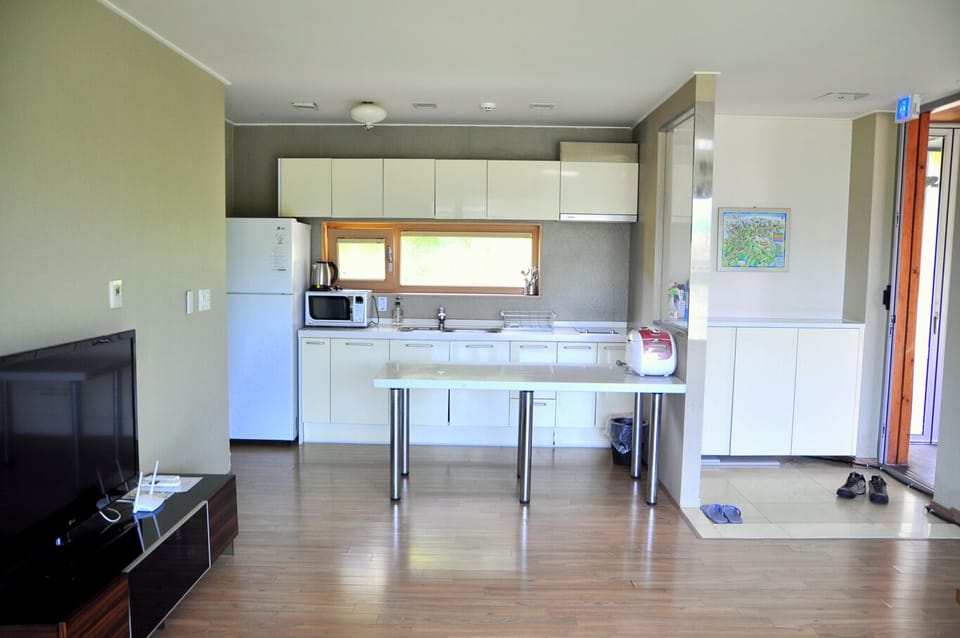 Family House | Private kitchen | Fridge, microwave, stovetop, rice cooker