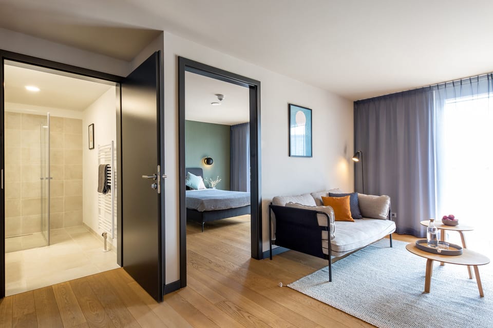 Apartment Medium with balcony | Living area | TV