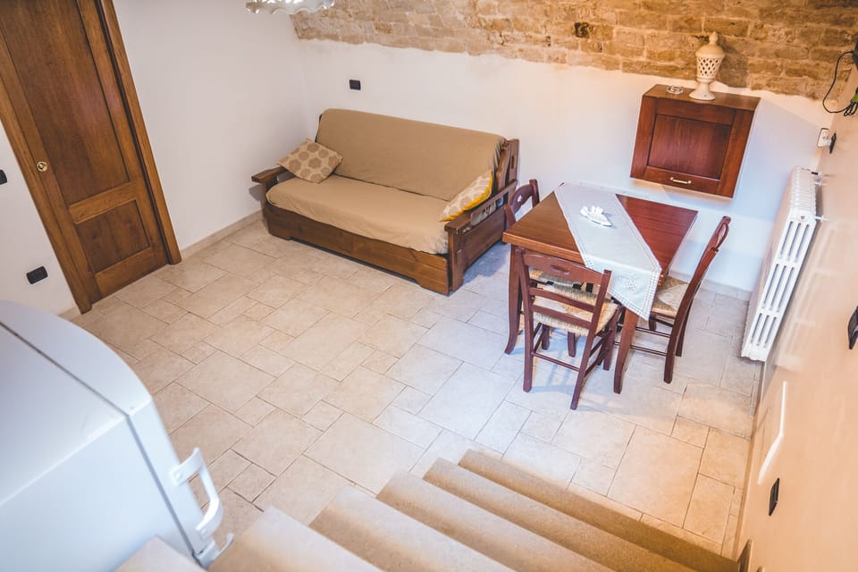 Studio (Basement) | Living area | Flat-screen TV